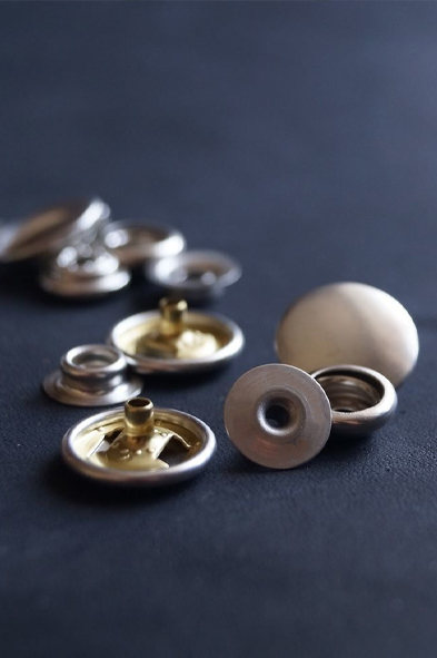 Metallknopf